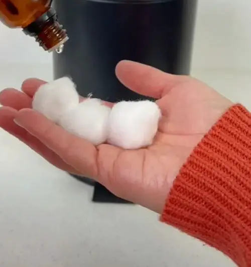 few drops of your favorite oil to cotton balls